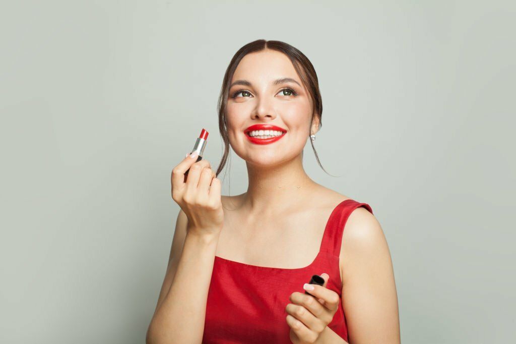 Girl Holding Lipstick